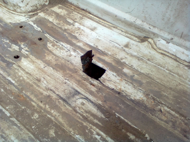 (I don’t know why I bothered to measure and cut such a tidy access door. The old bed is scrap metal anyway.)